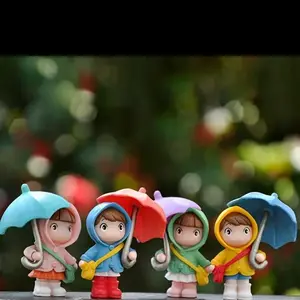 4pcs Adorable Raincoat Girl Charms with Colorful Umbrellas