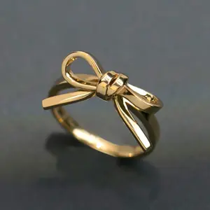 Elegant 18k gold-plated bow love ring, a pretty stackable bow engagement ring for women, suitable for weddings, engagements, parties, everyday wear, and birthday jewelry gifts.