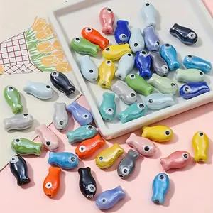 38pcs Ceramic Beads - Multicolor Aquarium-Themed Jewelry Making - Cute Fish Shapes with Eyes - for DIY Necklace, Bracelet, Keychain, Phone Chain - Crafting Projects - Beginner & Experienced Jewelers - Non-Toxic Ceramic Beads -