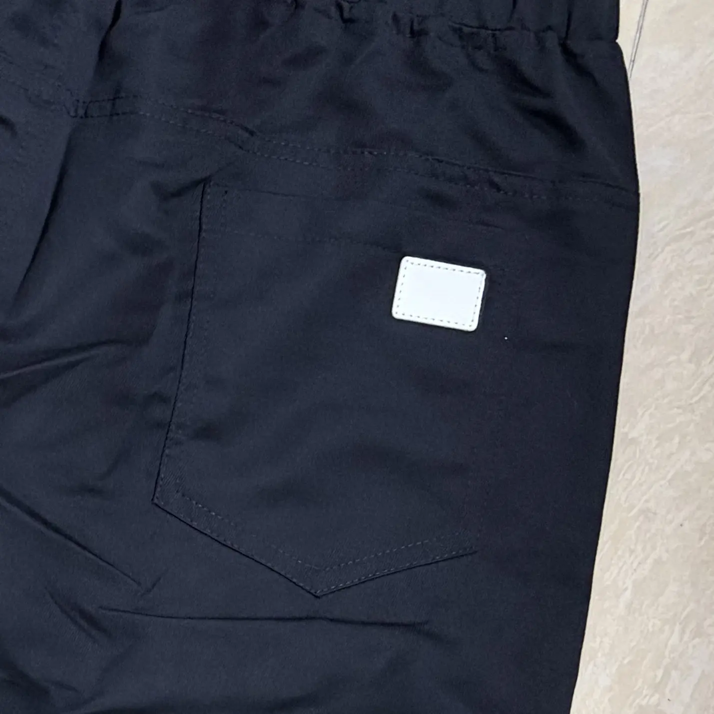 Men&rsquo;s 3-Pack Casual Jogger Pants &ndash; Khaki, Gray & Black &ndash; Elastic waistband with drawstring, ribbed cuffs, PU patch detail &ndash; Lightweight 100% polyester fabric &ndash; Perfect for streetwear, travel, everyday wear &ndash; Sizes S&ndash;XXL. We recommend choosing one size lar