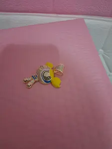 Gold Cartoon Character Pendant with Yellow Details – Urban Style Charm