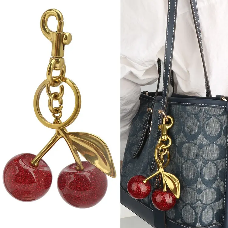 Women's Cute Gold Metal Cherry Motif Keychain - Glitter Resin Cherry Shape, Round Form with 2 Crystals, Fashion Costume Jewelry Bag Charm, Ideal Birthday Gift Accessory, Cherry Motif Keychains