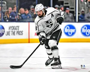 Drew Doughty Los Angeles Kings Unsigned White Jersey Shooting Photograph