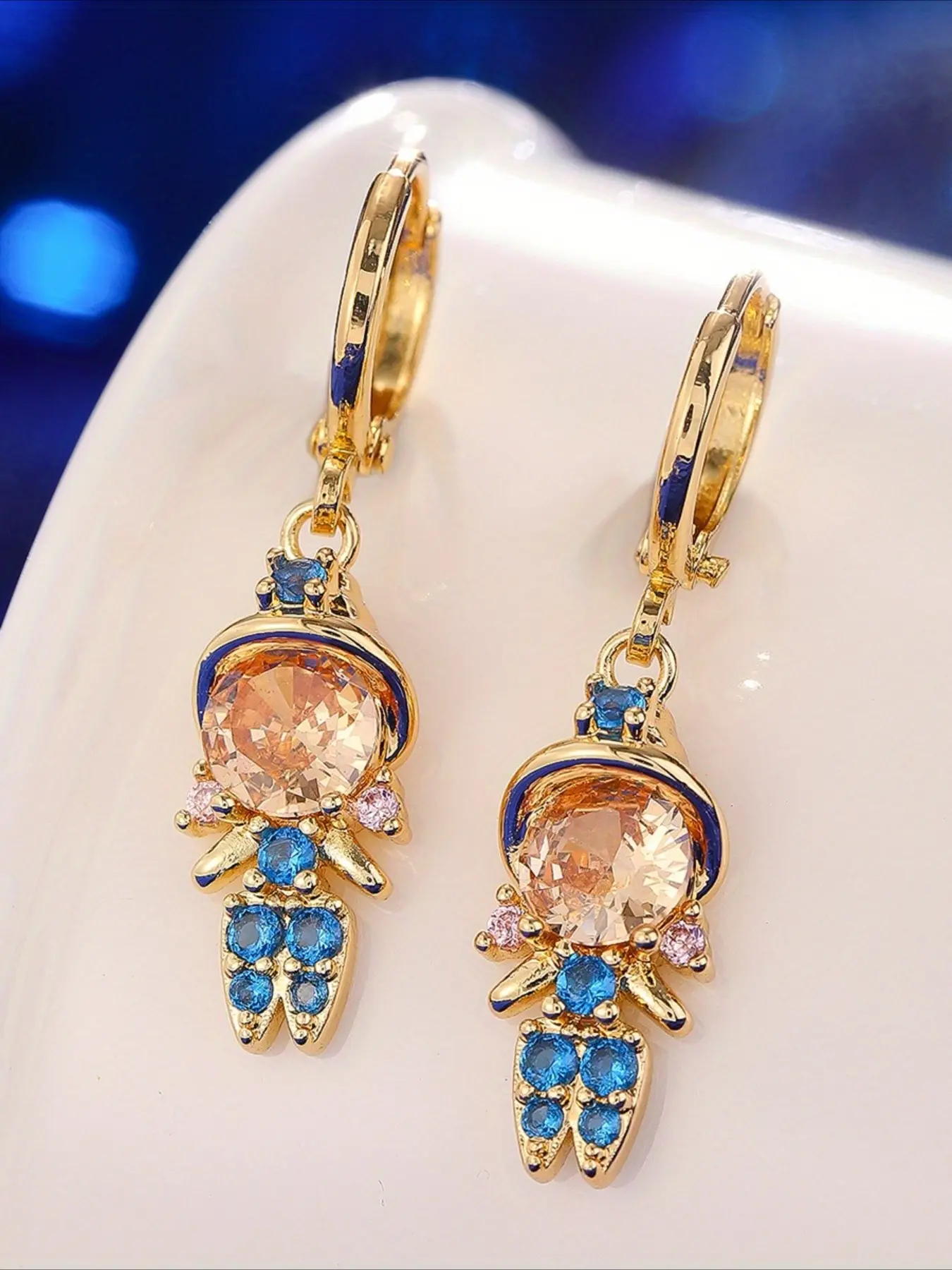 A Pair of Elegant Designer-style Princess Earrings, Ideal for Evenings Events and Family Gatherings.