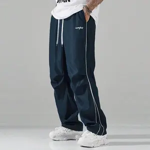 New Model 2026 Classic Navy Blue Track Pants with White Side Stripes Drawstring Waist for Men's Casual Wear