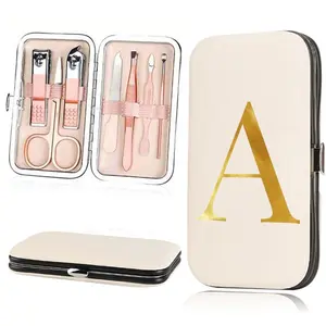 7 in 1 Stainless Steel Nail Care Tool Kit | Nail Clippers, Nail Trimmer, Nail File Set with Folding Storage Box | Multifunctional for Manicure/Pedicure (Home Use) | Golden & 26 Letters Pattern Options | Gifts for Halloween & Christmas