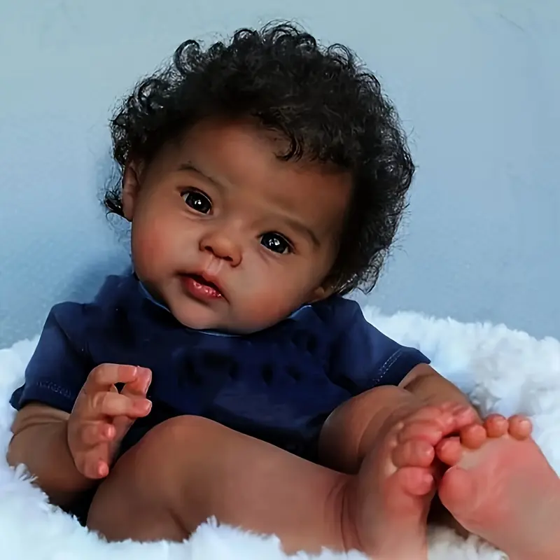 A complete set for the baby Realistic Reborn Baby Doll Raven Lifelike Curly Hair Dark Brown Skin Soft Touch Vinyl Bathable Blue Onesie Perfect Gift for Holidays Birthdays Playtime Safe Newborn Substitute Soft Stuffed Figure Soft Dolls Decoration