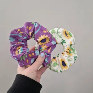 Sunflower fabric hair scrunchies in purple or white