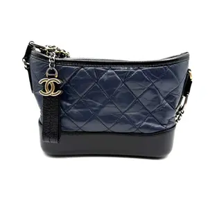 Pre-owned CHANEL Leather Shoulder Bags Gabrielle Hobo Small bag in navy blue aged calfskin and black smooth calfskin leather.