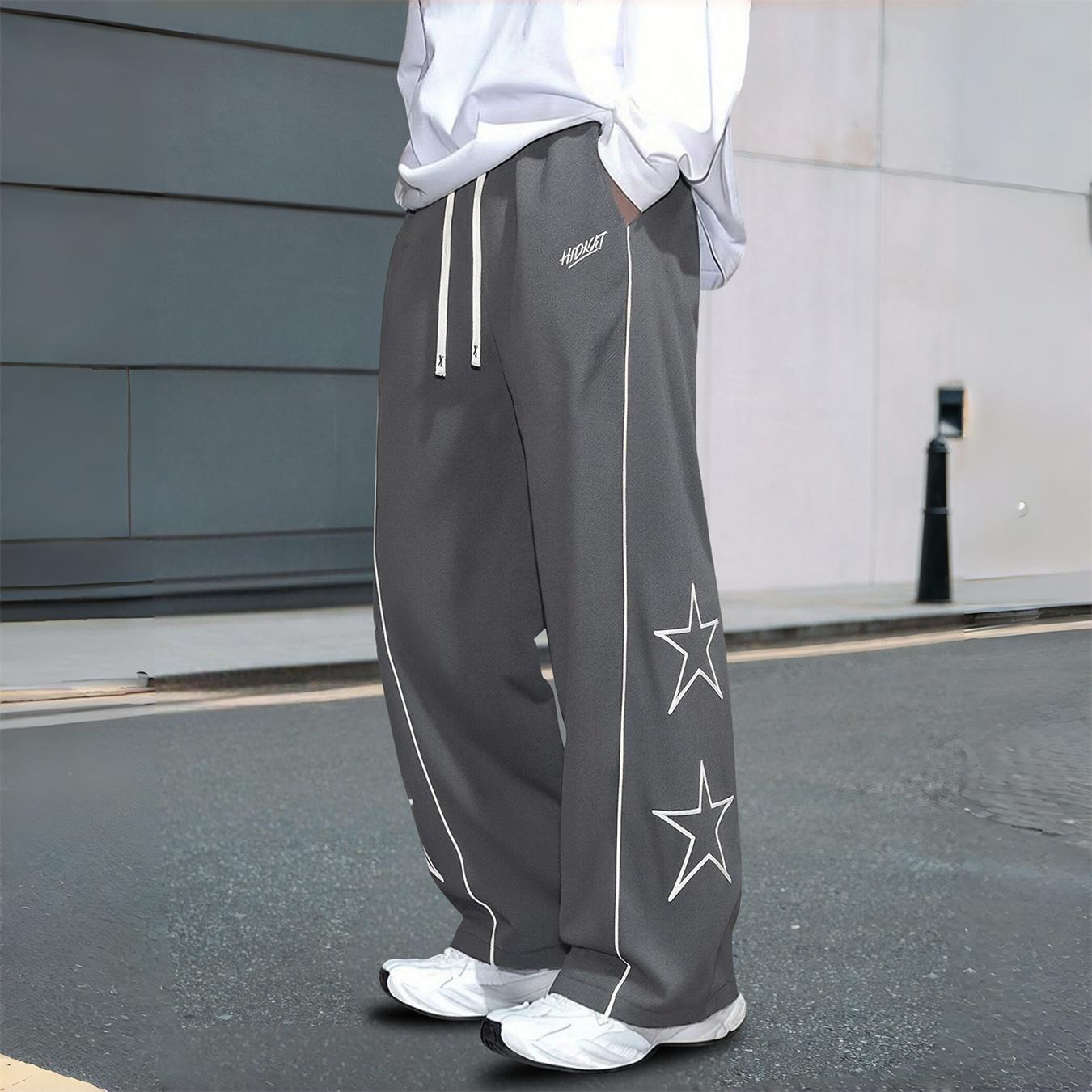 Men’s star print wide-leg track pants, drawstring streetwear sweatpants with contrast stitching, casual loose athletic bottoms for everyday wear