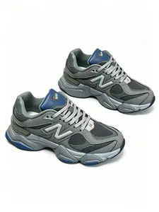 "The Y2K Revival Core" Millennial-style sports shoes arrived. 'Retro-futuristic lines and silver details pay homage to Y2K aesthetics.' A robust sole structure grants steady steps and a discreet lift, easily mastering high-street trends and vintage mixes.