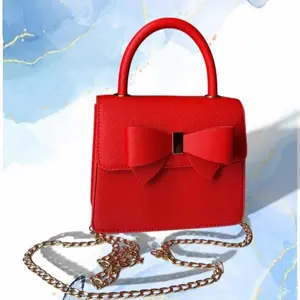 Red Bow Purse with Chain Strap and Elegant Design for Women