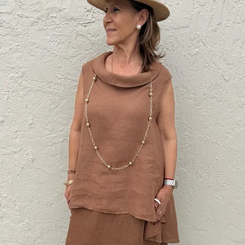 Fits from extra small to extra large one size 100 percent linen Anaí tunic sleeveless relaxed flowy top breathable lightweight natural fabric elegant minimal design versatile loose silhouette Ibiza style chic effortless outfit soft premium linen comfortab