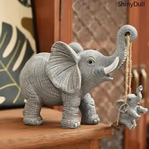 2-Piece Cute Elephant Art Figurine Set - Mini Resin Swinging Plain Finish Ornaments with Animal Design, Indoor Home Decoration for Living Room Desk Gifting