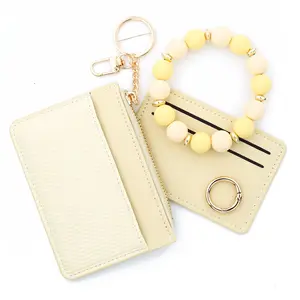 Butter Yellow Beaded Wristlet Wallet | Striped Card Holder with Zipper Pocket | TikTok Finds for Everyday Carry#TikTokFinds #ViralTikTok #NeutralAccessories #CreamWallet #BeadedWristlet