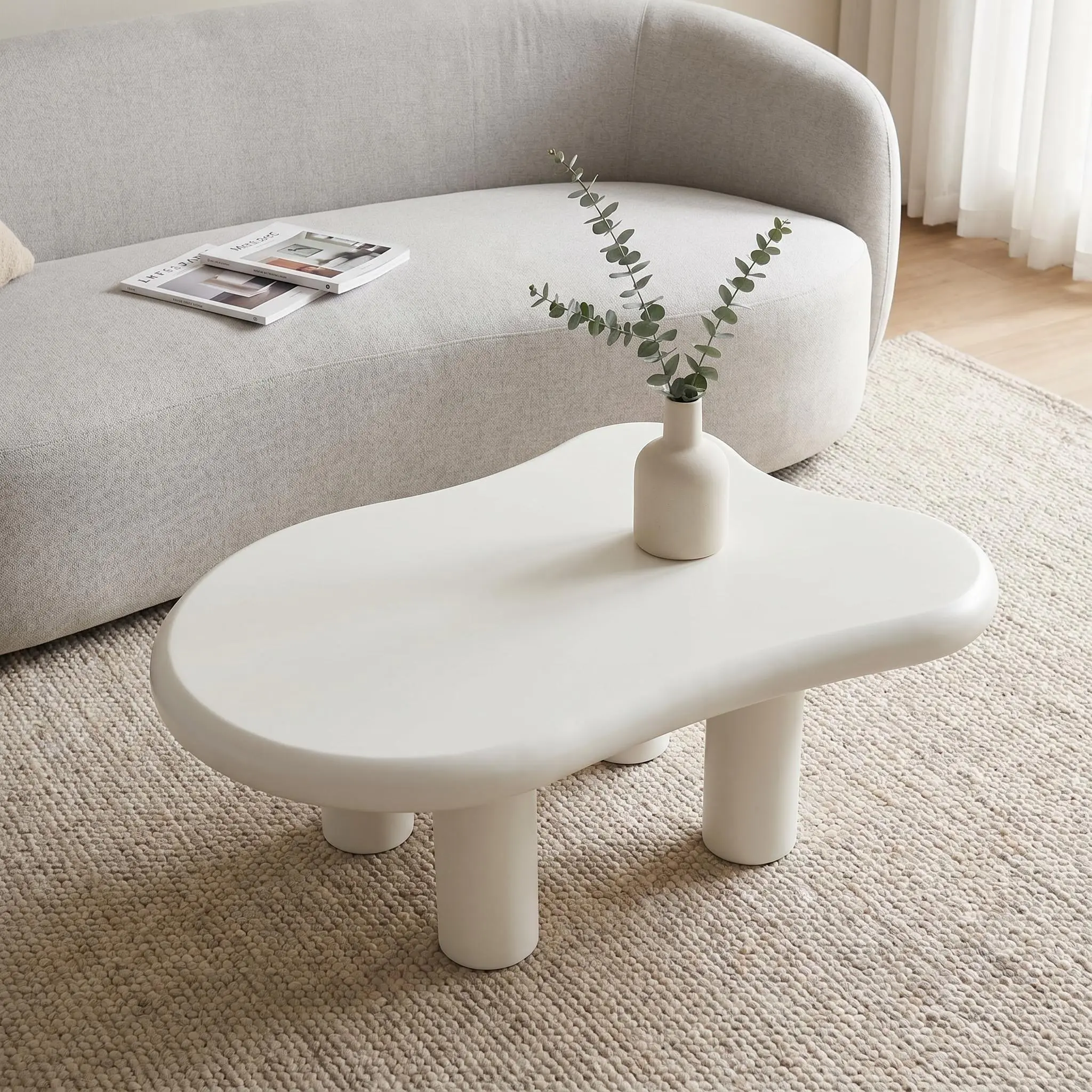 Cloud coffee table, modern design, fashionable simplicity, overall white cream style, suitable for placement in living rooms, lounges, study rooms, etc., can add a touch of color to the room