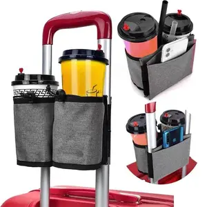 Multi-functional trolley case organizer with hands-free milk tea cup holder, suitable for two coffee cups - rolls up onto the suitcase handle - a great gift for flight attendants and frequent travelers. Velcro closure.