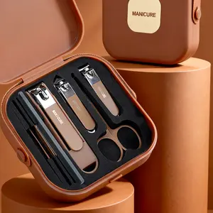 Manicure Nail Clipper Tool Set with Scissors and Stainless Steel Accessories for Personal Care and Grooming in Brown Case