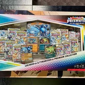 Prismatic Evolutions Lucario ex & Tyranitar ex Premium Collection - Includes 1 Mini Art Card