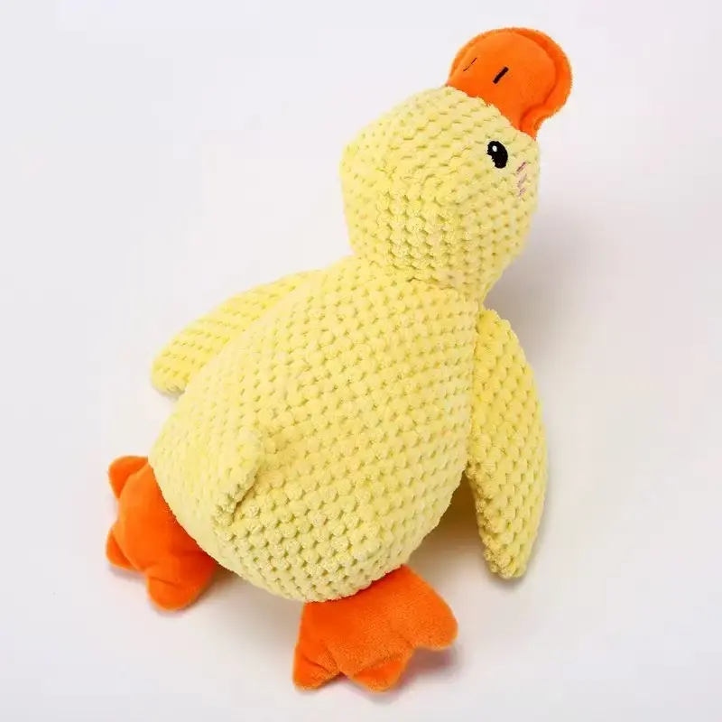 Cute plush yellow duck dog toy — makes a squeaking sound, bite-resistant Cute plush yellow duck dog toy — makes a squeaking sound, bite-resistant