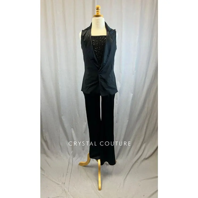 Black sequin unitard with flare bottoms and black vest