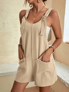 A women's solid color casual fashion overalls Sleeveless with patch pockets, adjustable straps, and knot design, suitable for summer, daily outings, beach vacations, or weeend picnics.