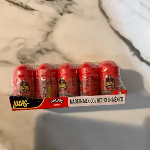 Lucas chamoy   Or mango powdered candy