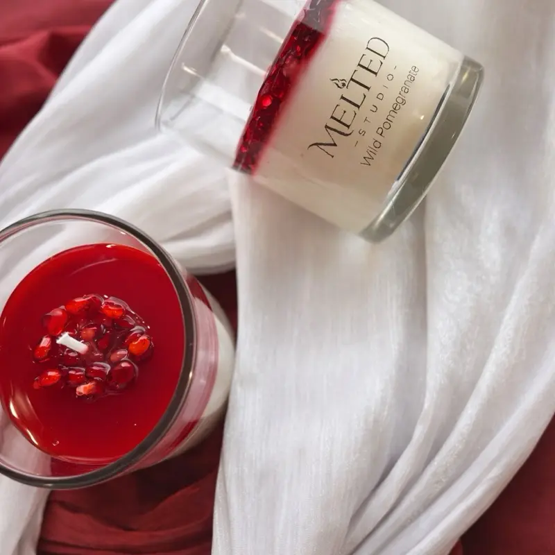 Melted Wild Pomegranate Scented Handcrafted Candle with Rich Red Wax and Pomegranate Seeds for Aromatic Home Decor