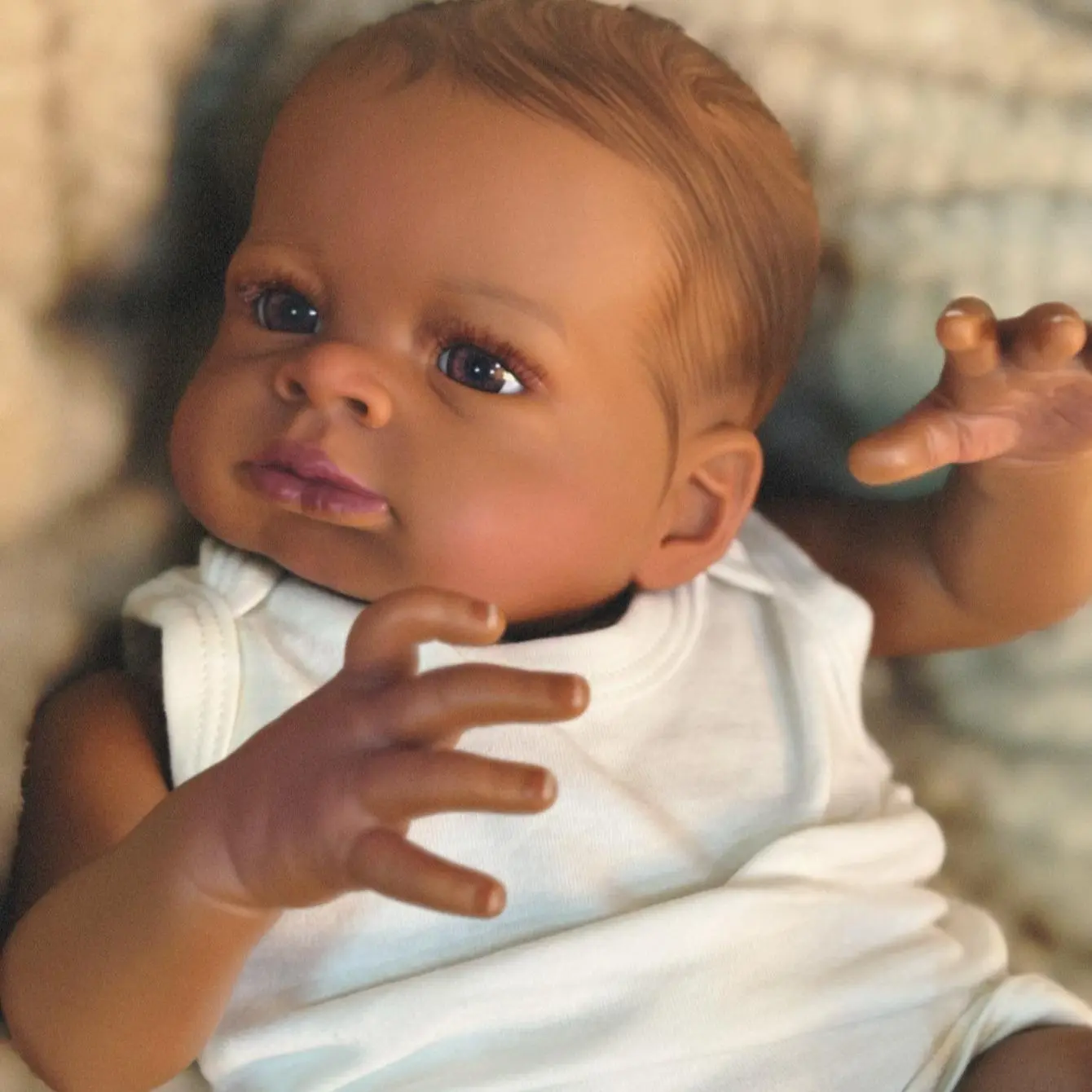 18-inch dark skin reborn doll, vinyl material + cloth body, genderless, lifelike doll with realistic details, includes complete accessories, perfect for cuddling and play, ideal as a birthday gift, collectible piece, and a perfect gift for children.