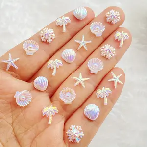50pcs Mixed Cute Mini Starfish, Shells, Christmas Snowflakes, Flat Bottomed Back for Nail Rhinestones, Resin Material, Craft Decorations, Fashionable Rhinestone Decorated