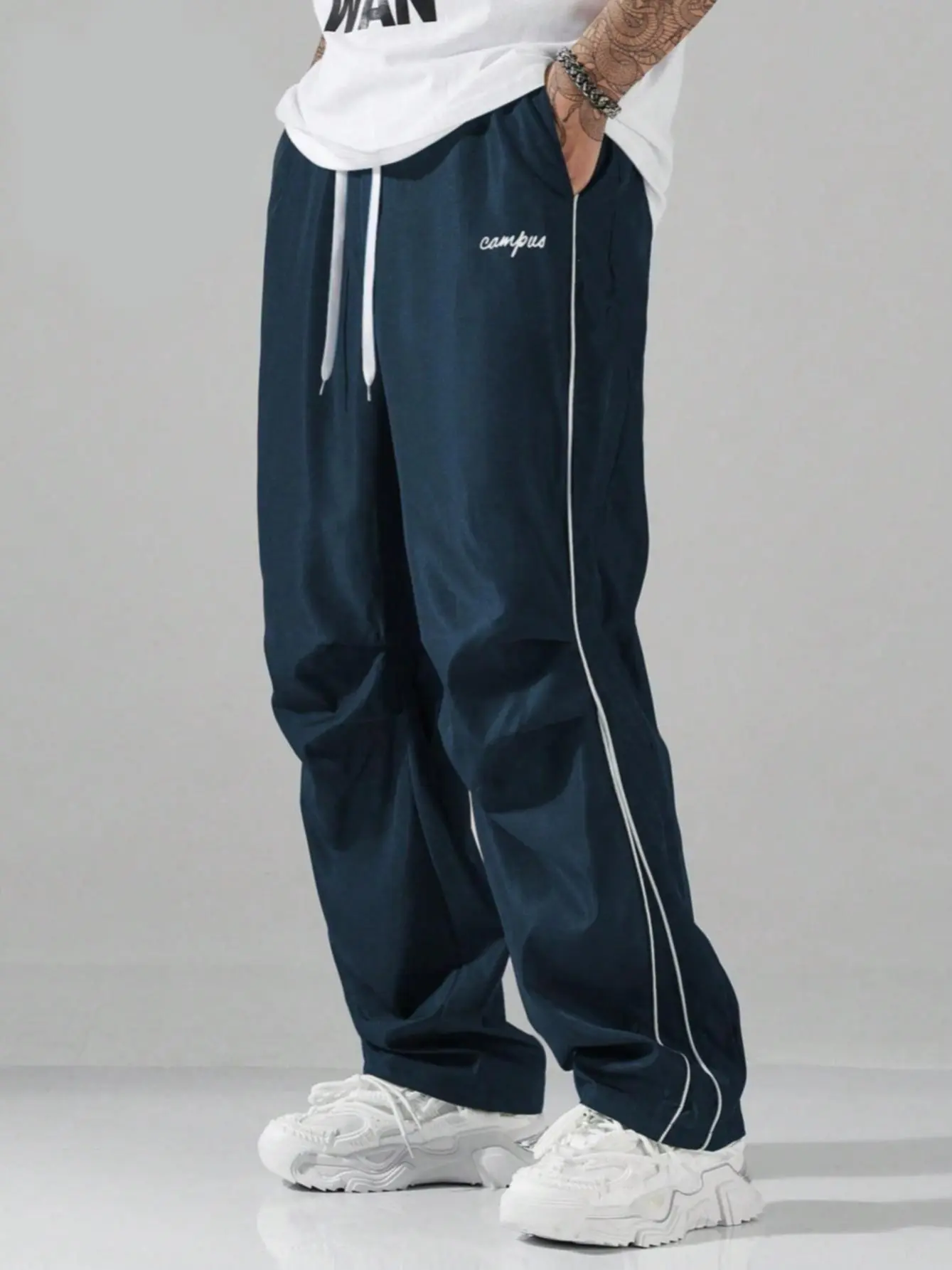 Male Polyester Athletic Track Pants - Chic Casual Style, Continuous Dual Strips Accent, Low Profile Front Script Embroidery, Dual Knottable Drawcord Fit, Anti-Sticky Sweat-Wicking Wrinkle-Resistant Fabric, Machine Washable, Ideal for Lounging/Jogging, Tra