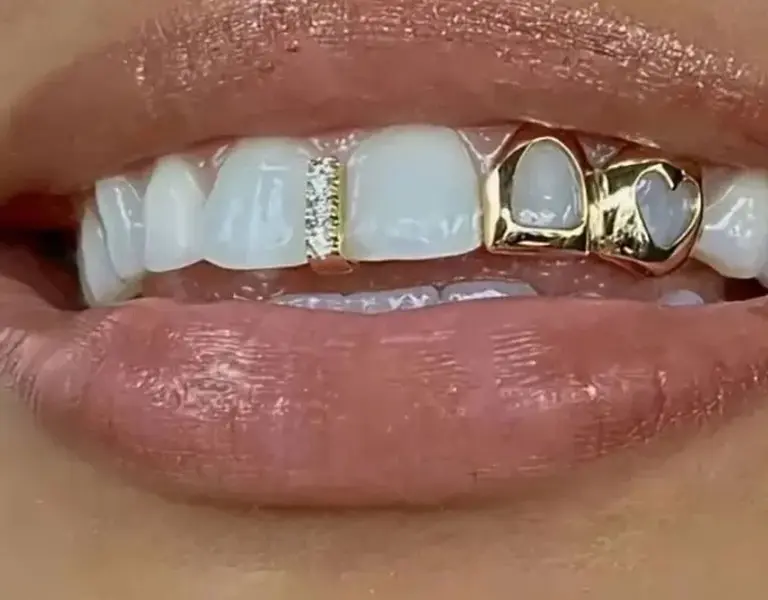 14K Gold Plated Iced CZ Gap + Double Open Face Heart Grillz Set 14K Gold Plated Iced CZ Gap + Double Open Face Heart Grillz Set
