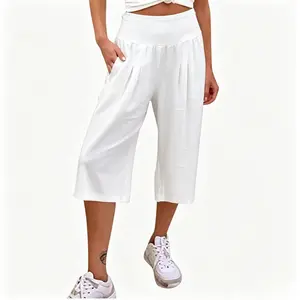 Women’s summer cotton-linen three-quarter wide-leg pants with a gathered waistband and pockets, loose fit for fresh country-style outings.