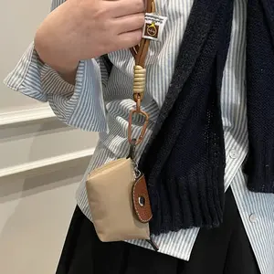 Elegant Women's Mini Pendant with Leather Wrist Strap, Simple Zipper Design, Fashion Flower Charm Accessory, Zip Around Wristlet