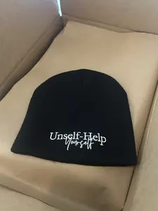 Beanie with slogan: Unself-Help Yourself