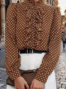 A ladies' brown polka dot ruffled stand-up collar long-sleeved bubble fitted blouse shirts for an elegant style outfit Womenswear