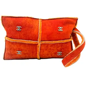 Pre-owned CHANEL suede and shearling Clutches & Wristlets Orange Shearling Suede Mouton Wristlet Bag