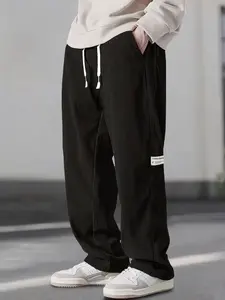 Men's Solid Color Pocket Drawstring Waist Corduroy Sports Pants Fashion Loose Wide-Leg Straight-Leg Men's Pants Autumn Winter Street Style Casual Outfit solid drawstring waist sweatpants