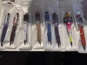 Beaded Pens with bookish sayings, bows, or beads alone - comes with an extra ink refill