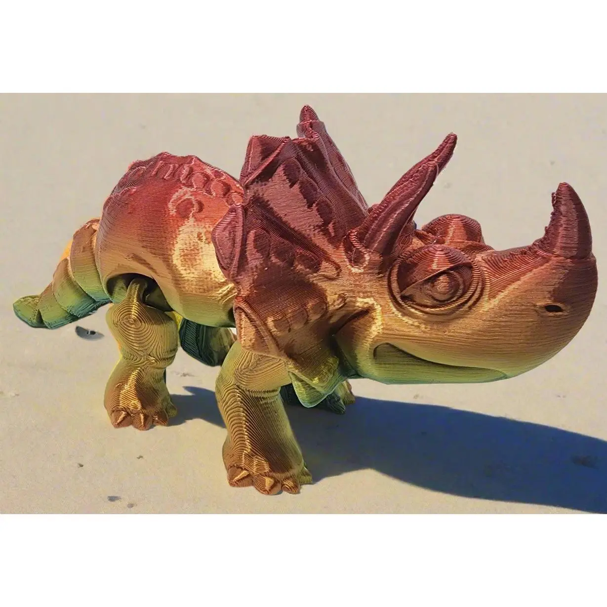 The Articulating Rainbow Triceratops Sculpture / Fidget Toy