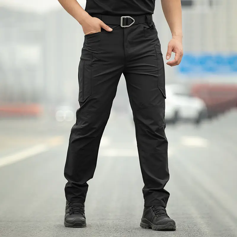 HOMUG Men’s solid-color tactical cargo pants with multiple zippered pockets. Available in various colors, the pants do not include a belt. They are suitable for spring and summer wear as well as outdoor casual occasions.