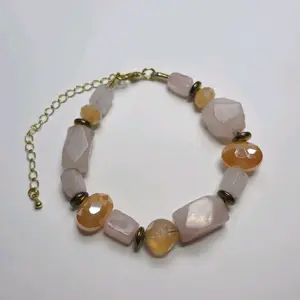 Rose Quartz Stone Bracelet with Gold Details Elegant Design for Women's Fashion Jewelry