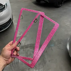 Pink bling diamond license plate frames.
