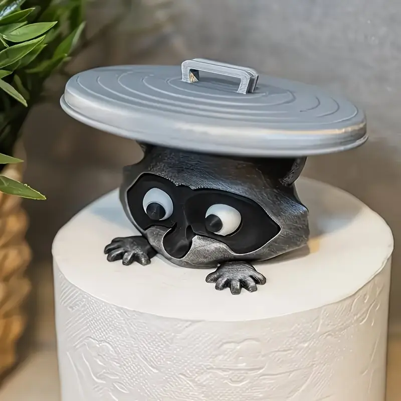 A 3D printed raccoon tissue holder, the bathroom is decorated with expressive eyes and durable plastic, providing space-saving novel gifts for animal lovers and home accessories, Toilet Paper Organizer