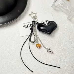 Heart-shaped Y2K pendant keychain with tassels, personalized keychain, vintage leather braided strap bag accessory, suitable for daily accessories and holiday gifts
