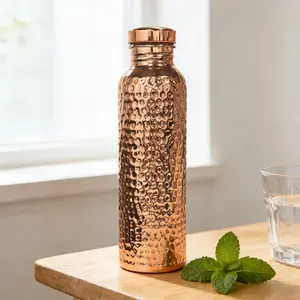 27 oz (800 ml) copper-colored water bottle, electroplated liner, elegant hammered design, leak-proof lid, durable and hygienic, suitable for home, office and travel.