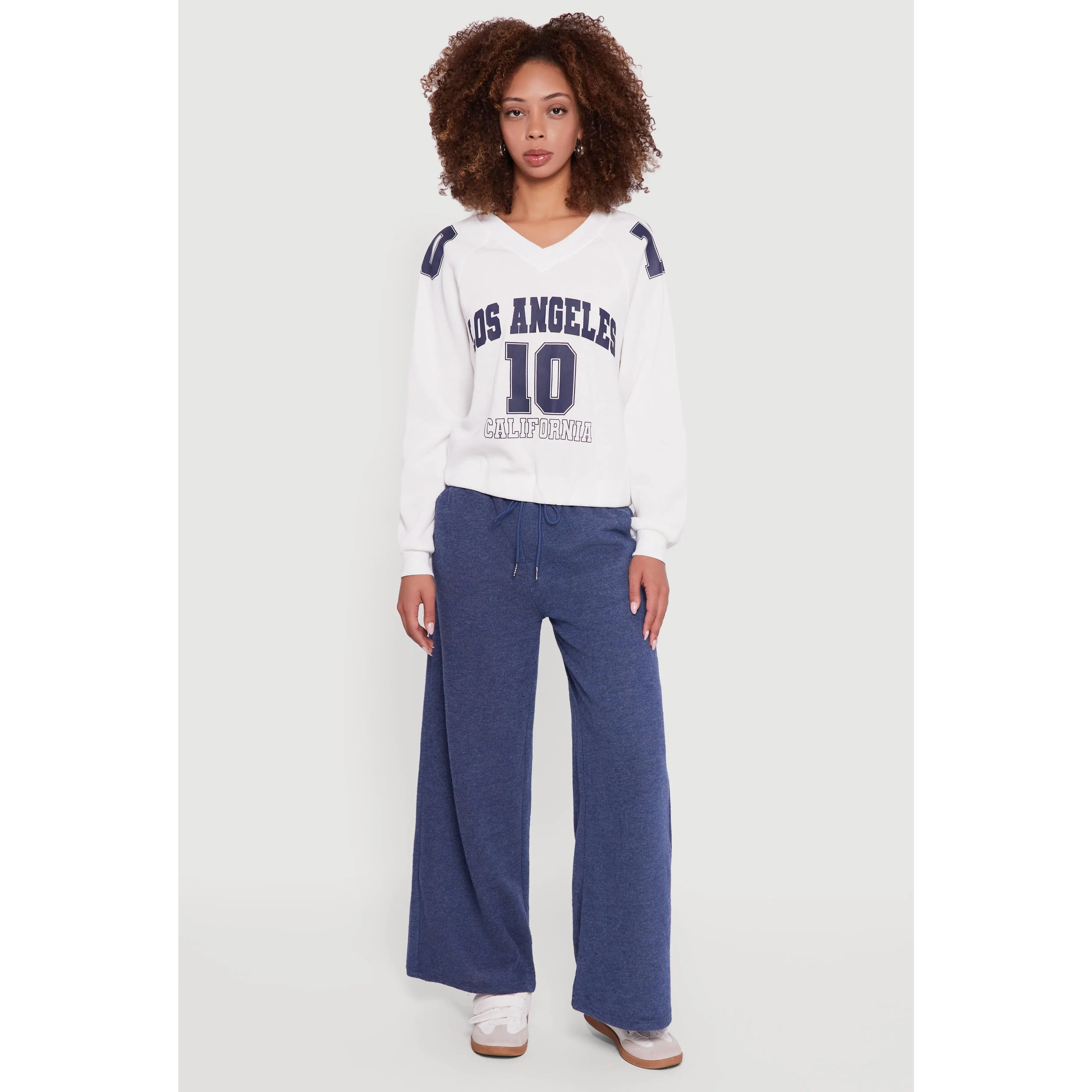 Almost Famous Elastic Hem Cropped Graphic Sweatshirt