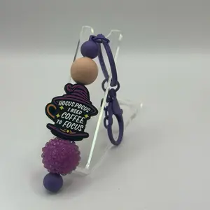 Hocus Pocus Beaded Keychain with Purple Beads and "I Need Coffee to Focus" Text Design