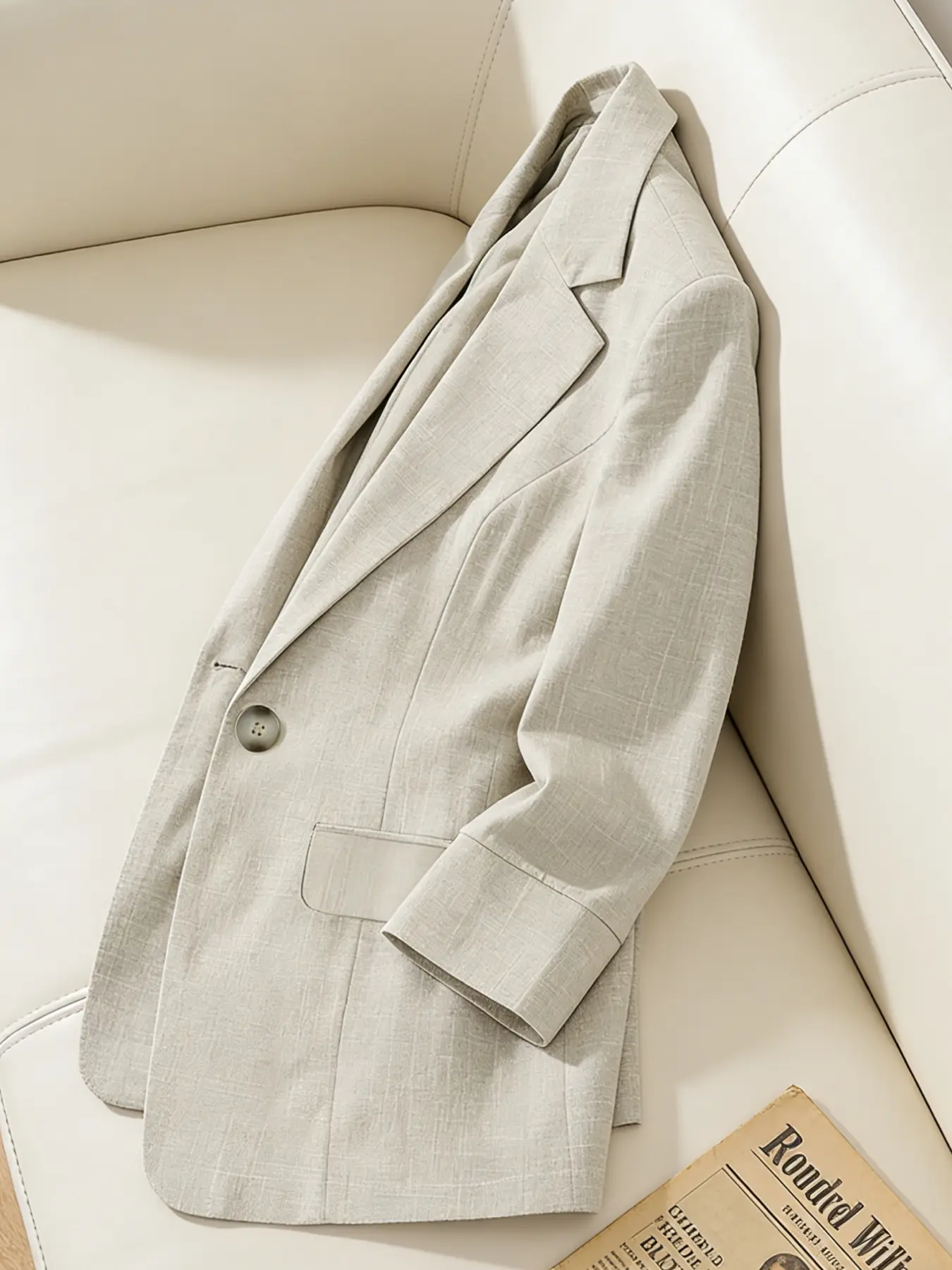 A women's light, mature style suit jacket, Fitted blazer jacket, with seven quarter sleeves, cinched waist, slim commuting temperament, Office workwear. Casual small suit suitable for spring, autumn, home, indoor, and ou