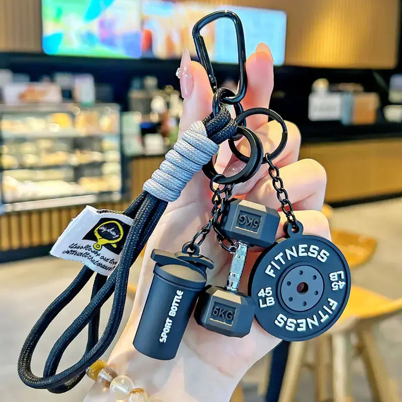 1 Creative Multifunctional Barbell-Shaped Pendant—featuring silicone dumbbell and weight plate designs; a stylish accessory for bags and keys, perfect for daily use and an ideal gift for fitness enthusiasts.